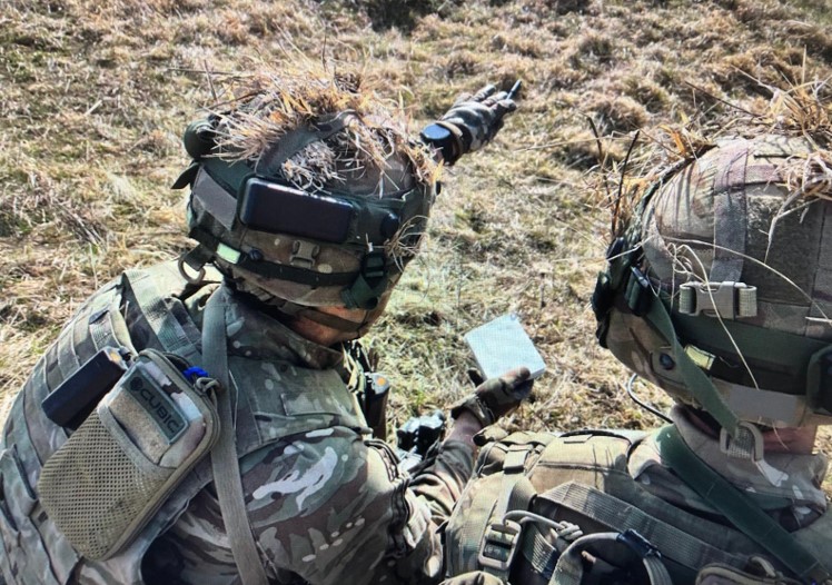 Photo by: Cubic training team. (2024). Officer Cadet from the Royal Military Academy Sandhurst using Cubic TES Equipment on Exercise Dynamic Victory. 